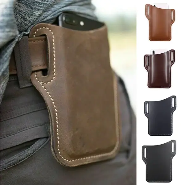 Vintage leather phone holster attached to a belt with a smartphone inside.